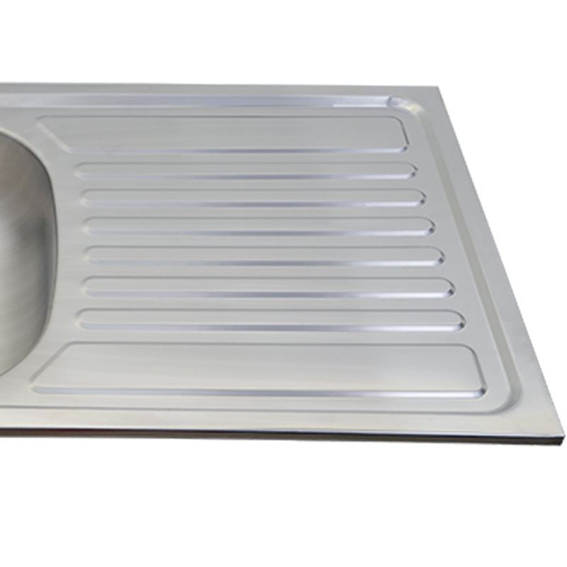 Drainer grooves pressed into the drainboard deck