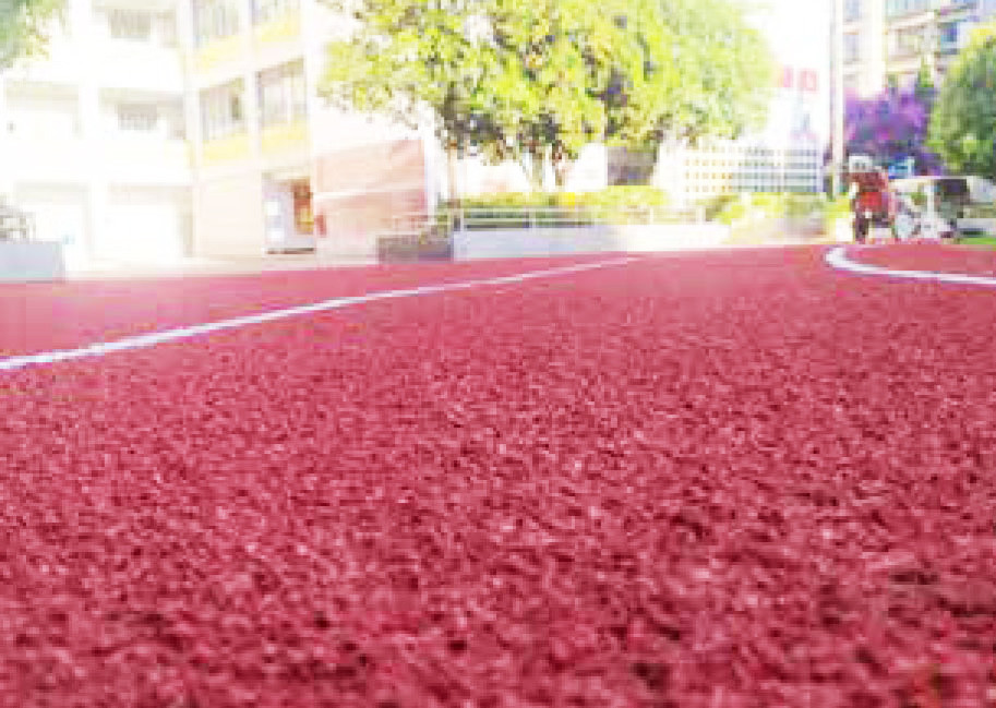 Self-Textured Rubber Track
