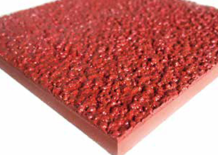 Self-Textured Rubber Track