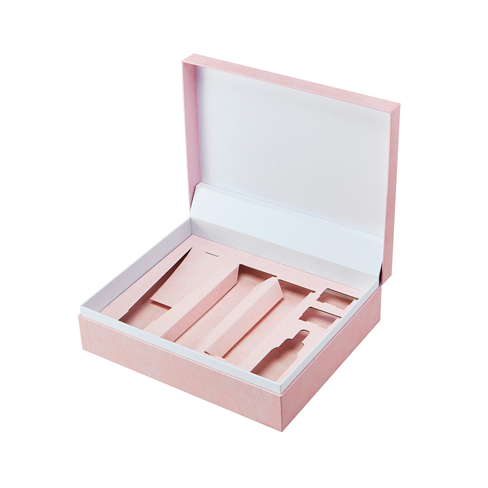 Custom rigid paperboard insert for skincare bottles and beauty products