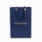 Custom Embossed Texture Luxury Paper Bags | Premium Apparel Packaging with Hidden Handles