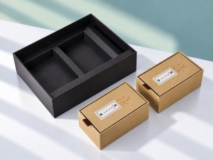 Luxury packaging box with paperboard insert