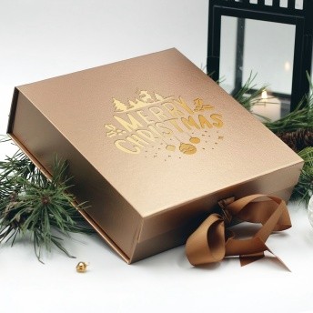 festive gift box surface finishing with gold foil stamping and debossed logo detail