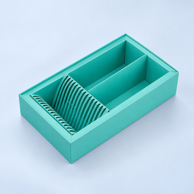 Custom paperboard packaging insert for rigid boxes
