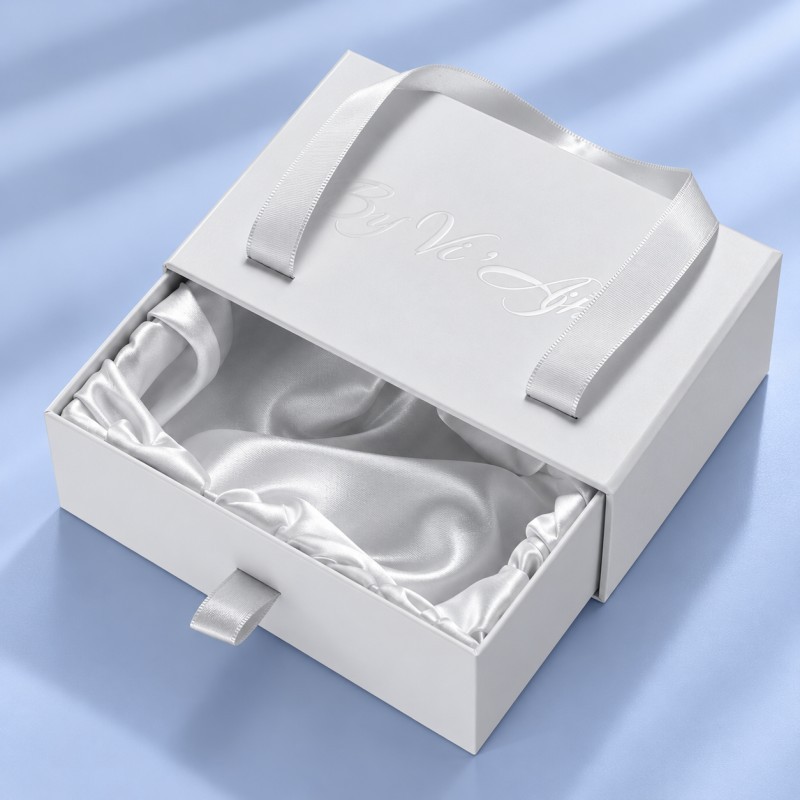 Fabric wrapped insert inside luxury jewelry drawer box