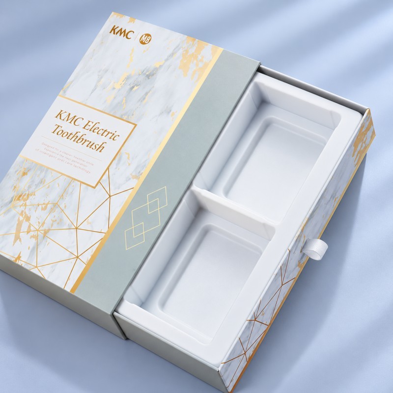 Molded pulp insert inside sliding drawer packaging