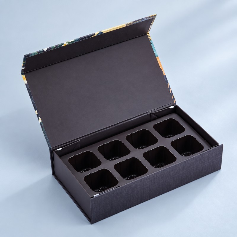Folding rigid box with custom product insert