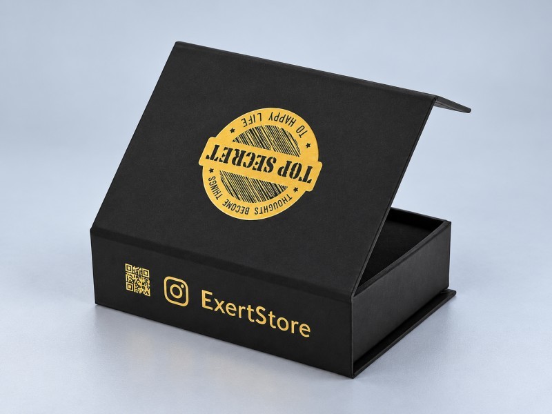 Magnetic rigid box beginning to open with controlled lid resistance