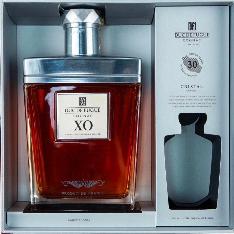 Luxury spirits gift box with colorful printed sleeve and paperboard insert