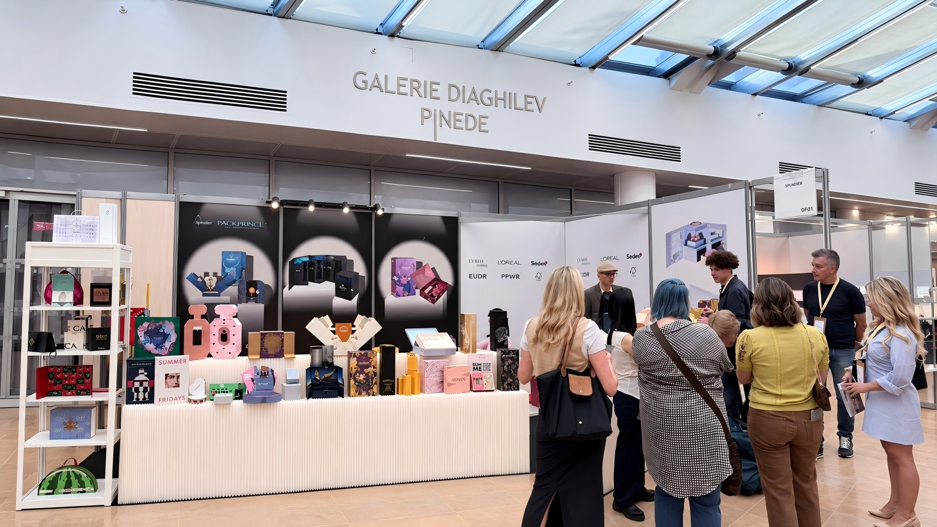 DHP Boxes international exhibition highlights showing packaging booths, team members and custom luxury packaging displays