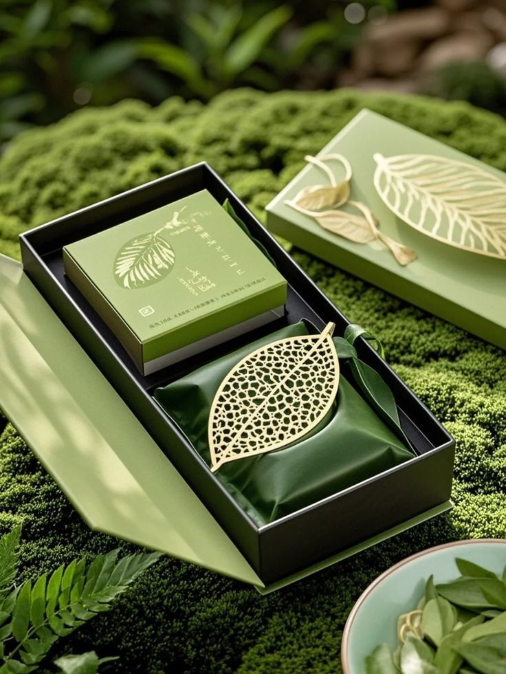 Botanical green luxury tea gift packaging inspiration with leaf motifs and coordinated inner presentation