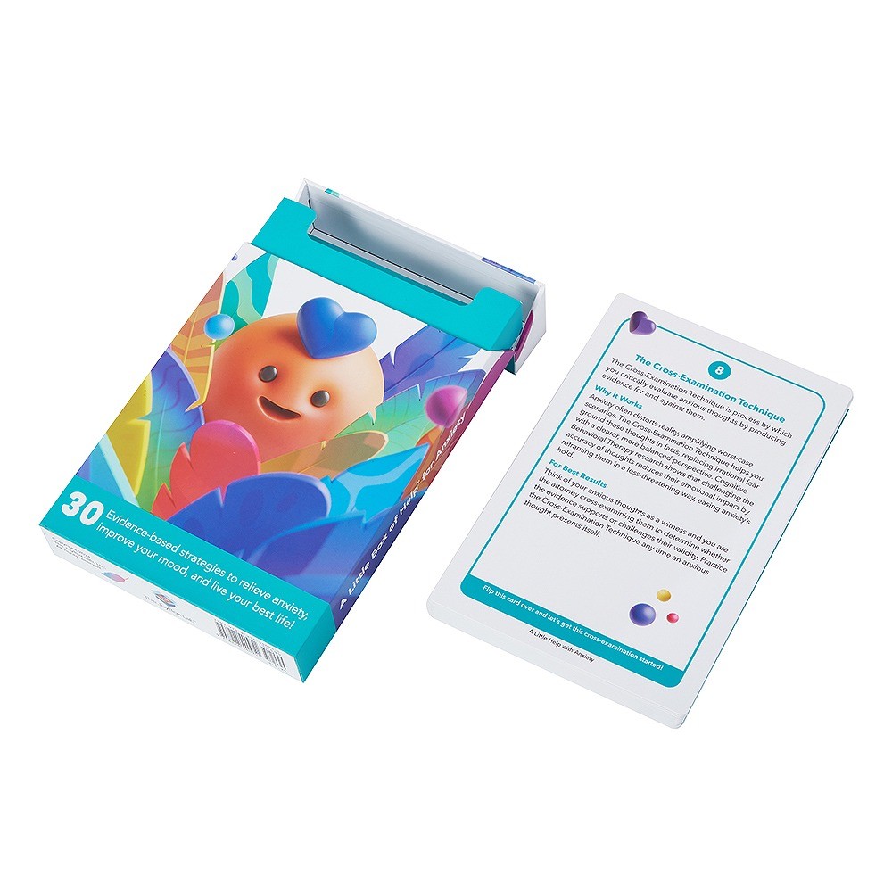 Open custom card packaging box showing internal paperboard card holder and stacked cards
