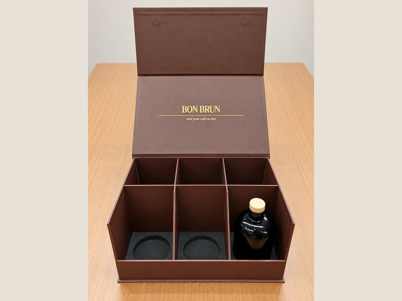Printed brown six-bottle magnetic rigid liquor gift box with internal dividers and custom EVA bottle supports