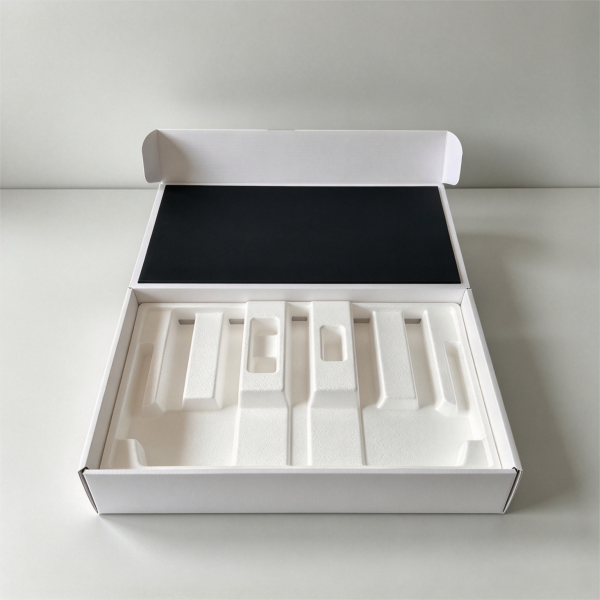 Custom molded fiber packaging insert