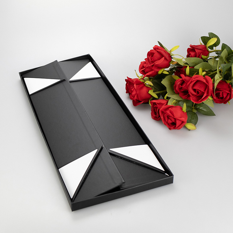 Black rectangular flower gift box components with paperboard support and red roses
