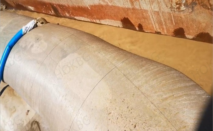 Submarine cable and pipeline protection plan uses geotextile tube bag construction