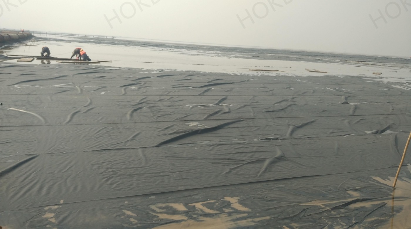 Construction of woven geotextile for soft soil foundation treatment