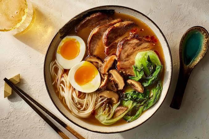 Four styles of Japanese ramen soup base served in bowls