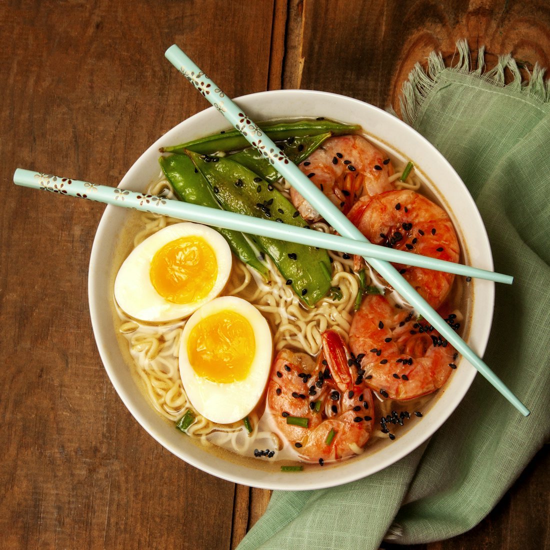 Finished ramen bowl made from a liquid ramen soup base in a restaurant