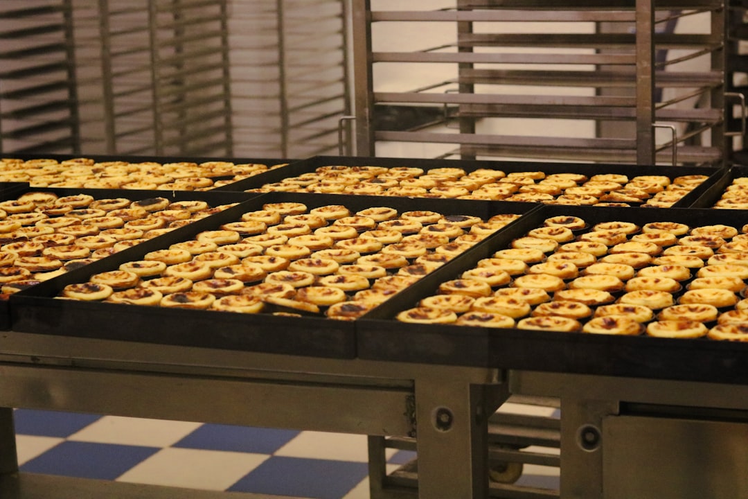 A multi-level commercial deck oven in a professional bakery setting