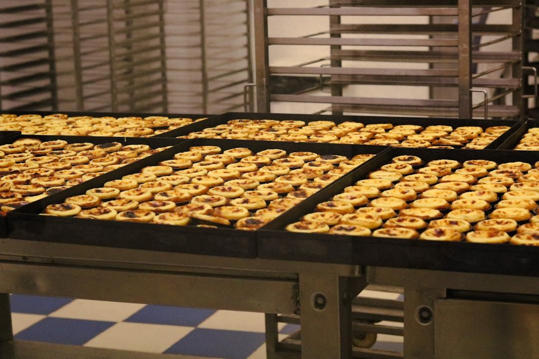 A multi-level commercial deck oven in a professional bakery setting