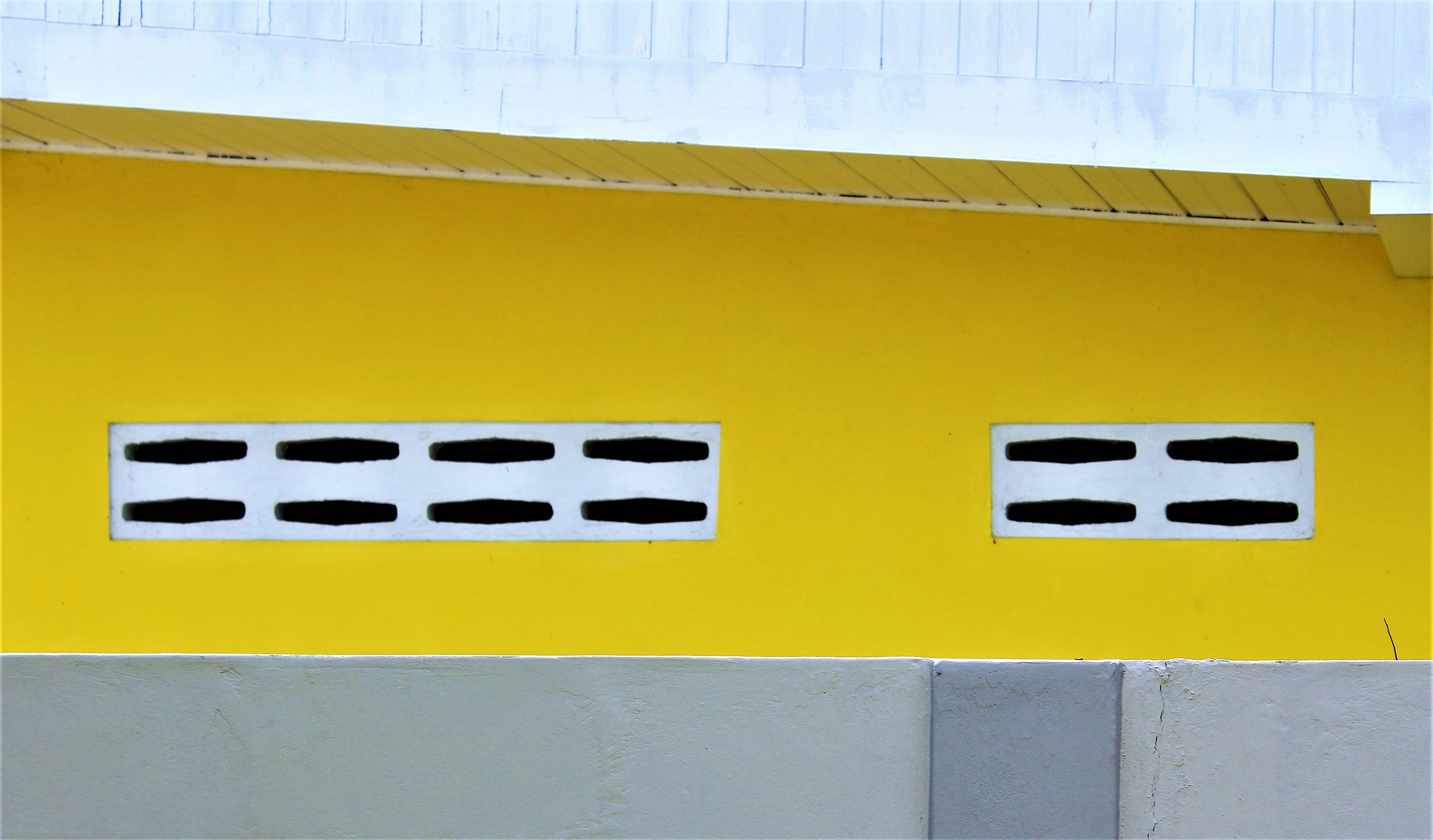 An eyebrow hood installed on top of a commercial deck oven, showing its position above the doors.