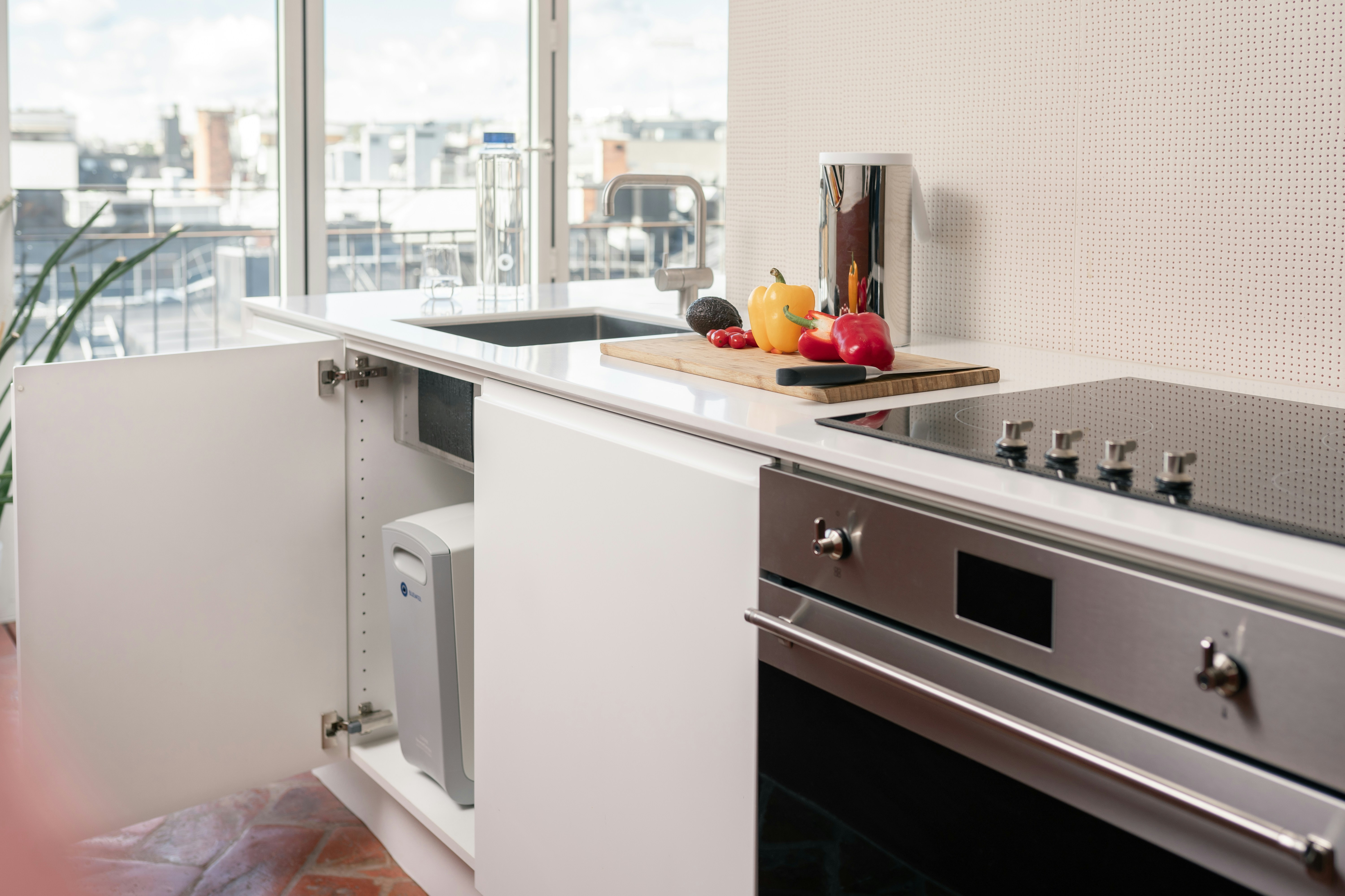 A sleek, multi-deck SamBake commercial deck oven in a professional kitchen setting.