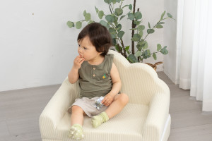 A Toddler’s Throne of Comfort and Safety