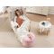 Tender Playful Soft Pink Faux Fur Round Ottoman for Cozy Bedroom or Lounge