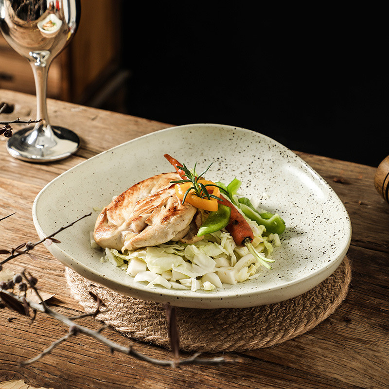 Close-Up of Textured Rim on White Porcelain Pasta Plate, Functional and Aesthetic Surface for Fine Dining