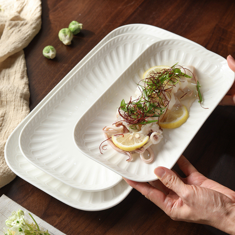 Front View of Minimalist Black Ceramic Salad Plate with Handmade Textured Surface