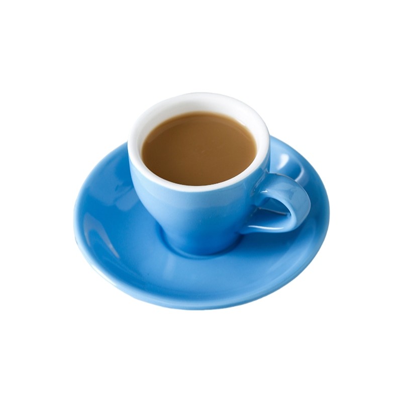 Ceramic Coffee Cup With Saucer In Use