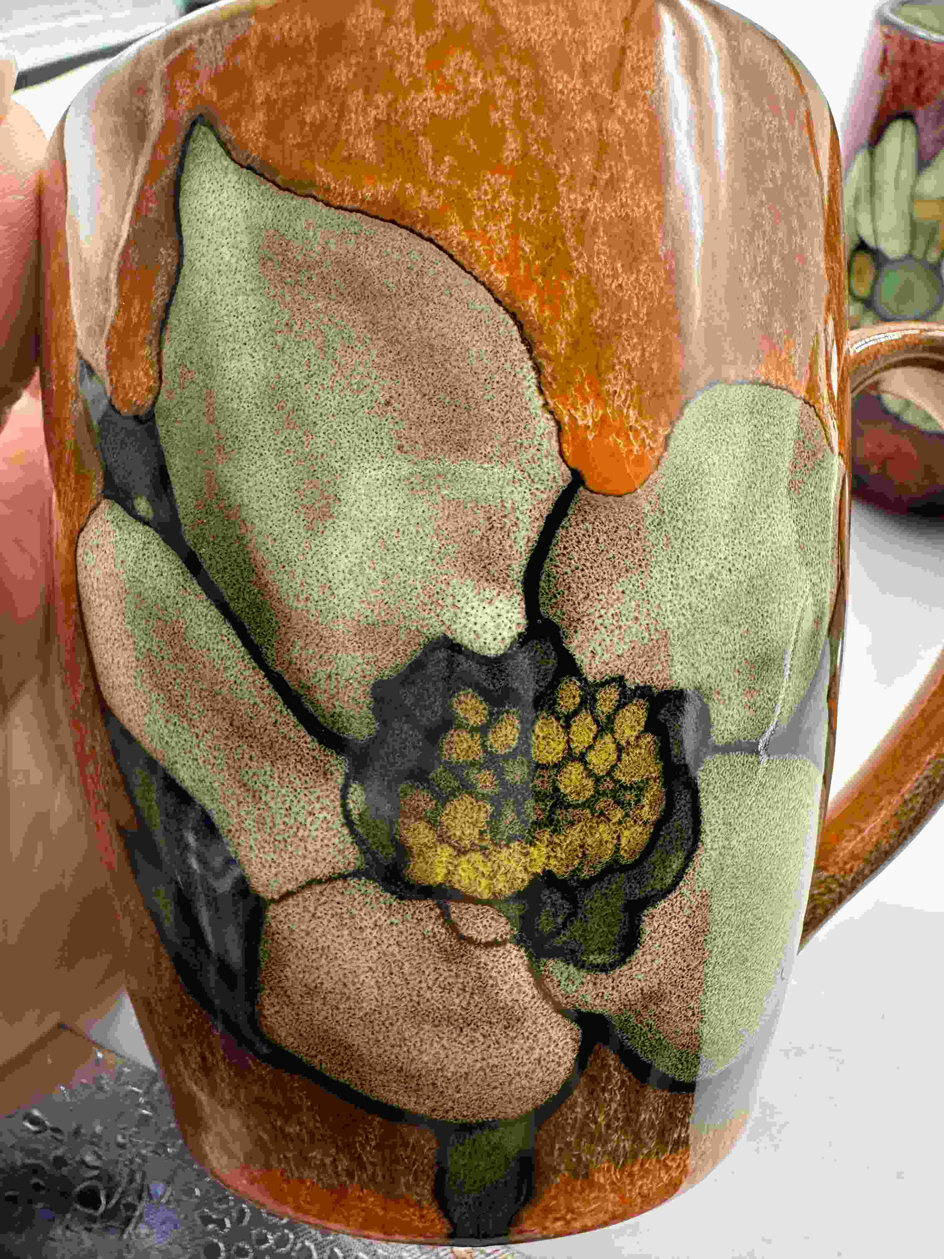 Close Up of Gold Electroplated Handle and Heart Design on White Bone China Coffee Cup, Premium Metallic Finish