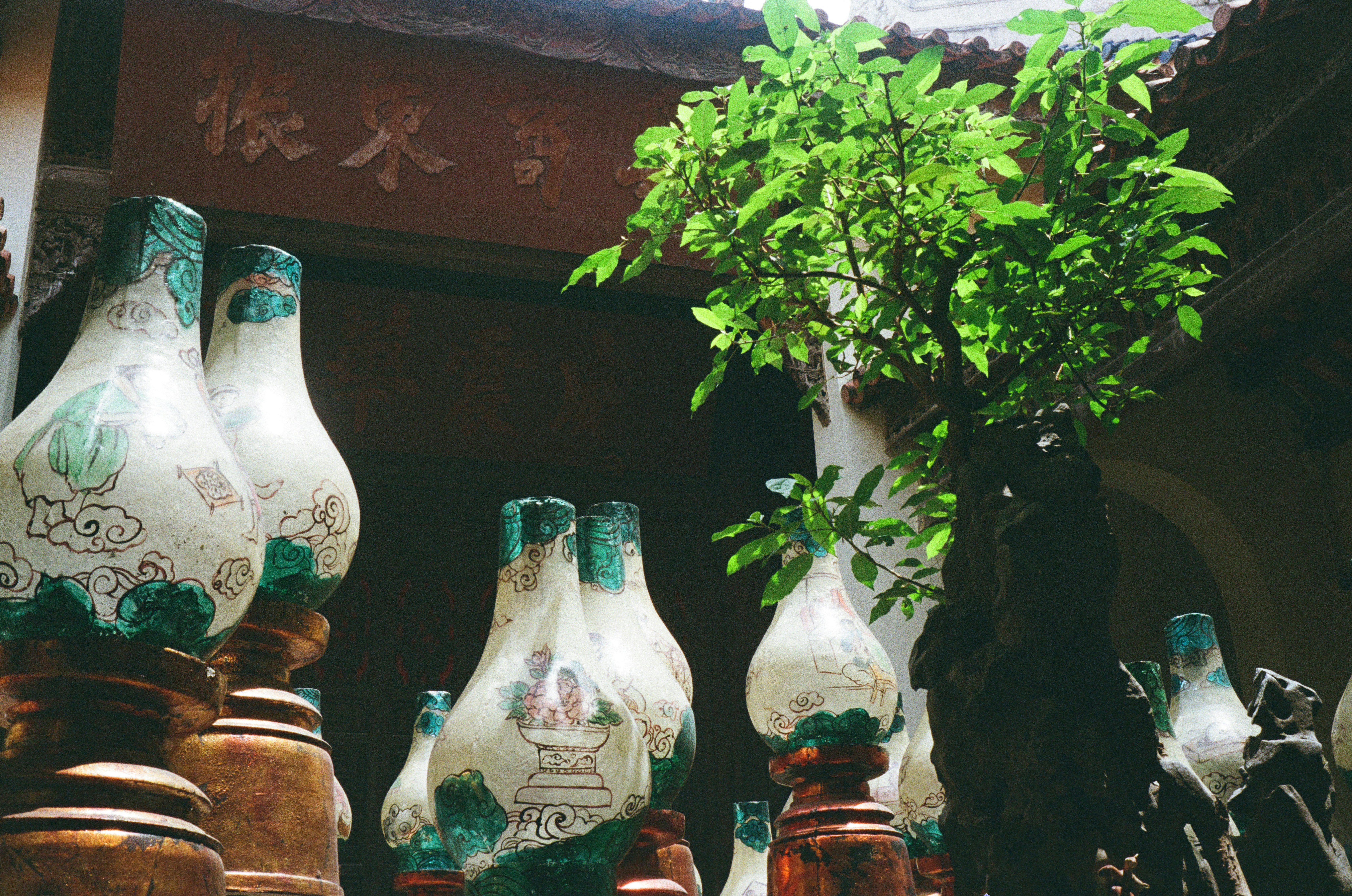 A collection of custom ceramic vases and planters for florists.