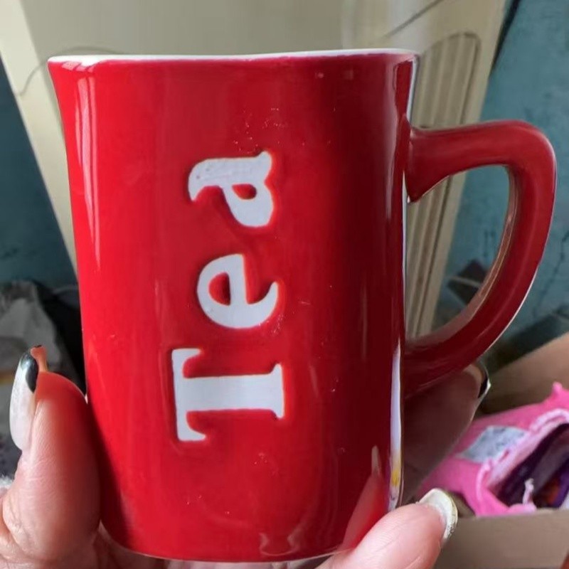 underglaze logo ceramic mug surface subtle branding coffee cup view