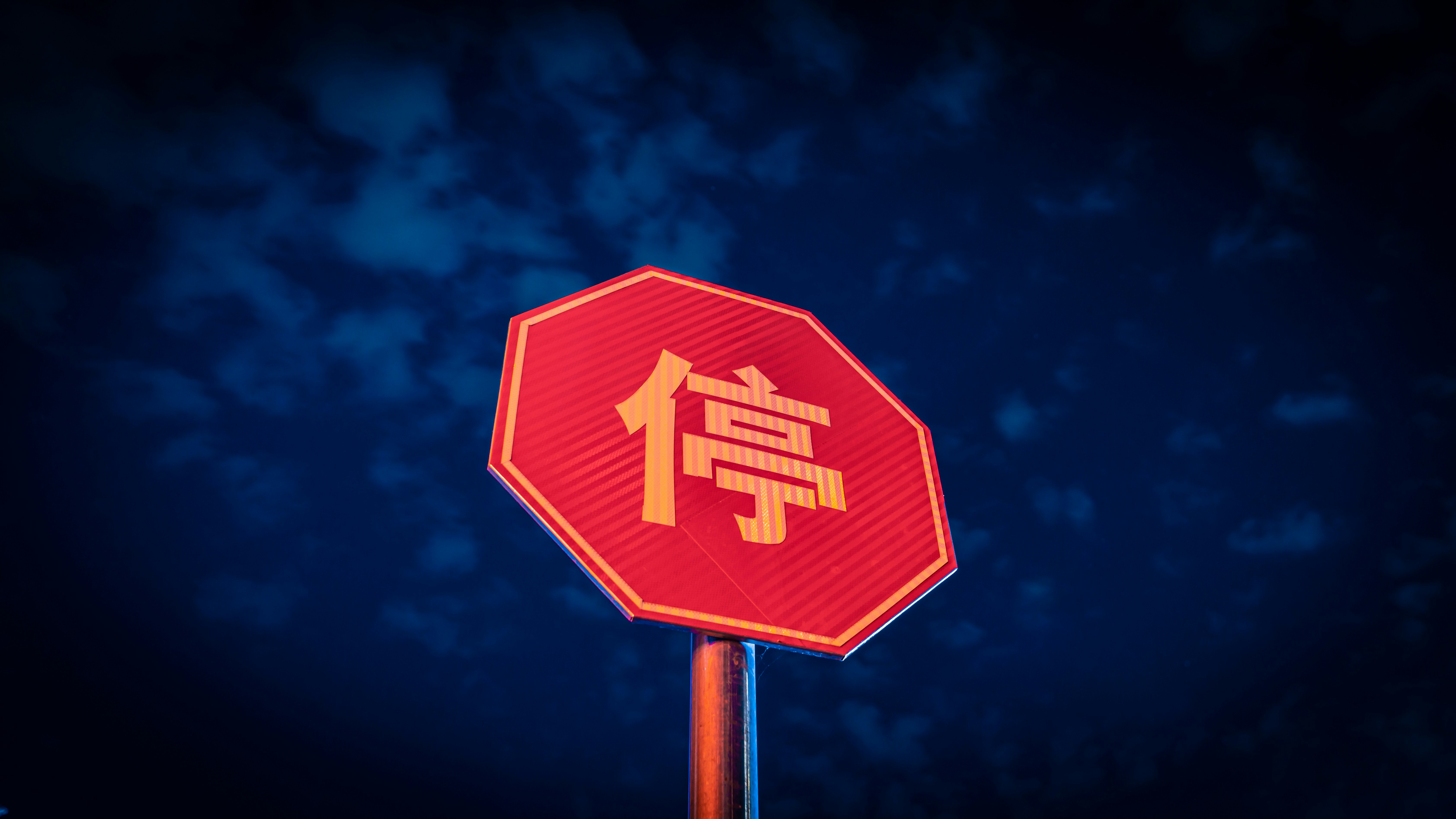 A graphic with a red stop sign and icons representing common supplier red flags like a 'too good to be true' price tag and a missing safety certificate.
