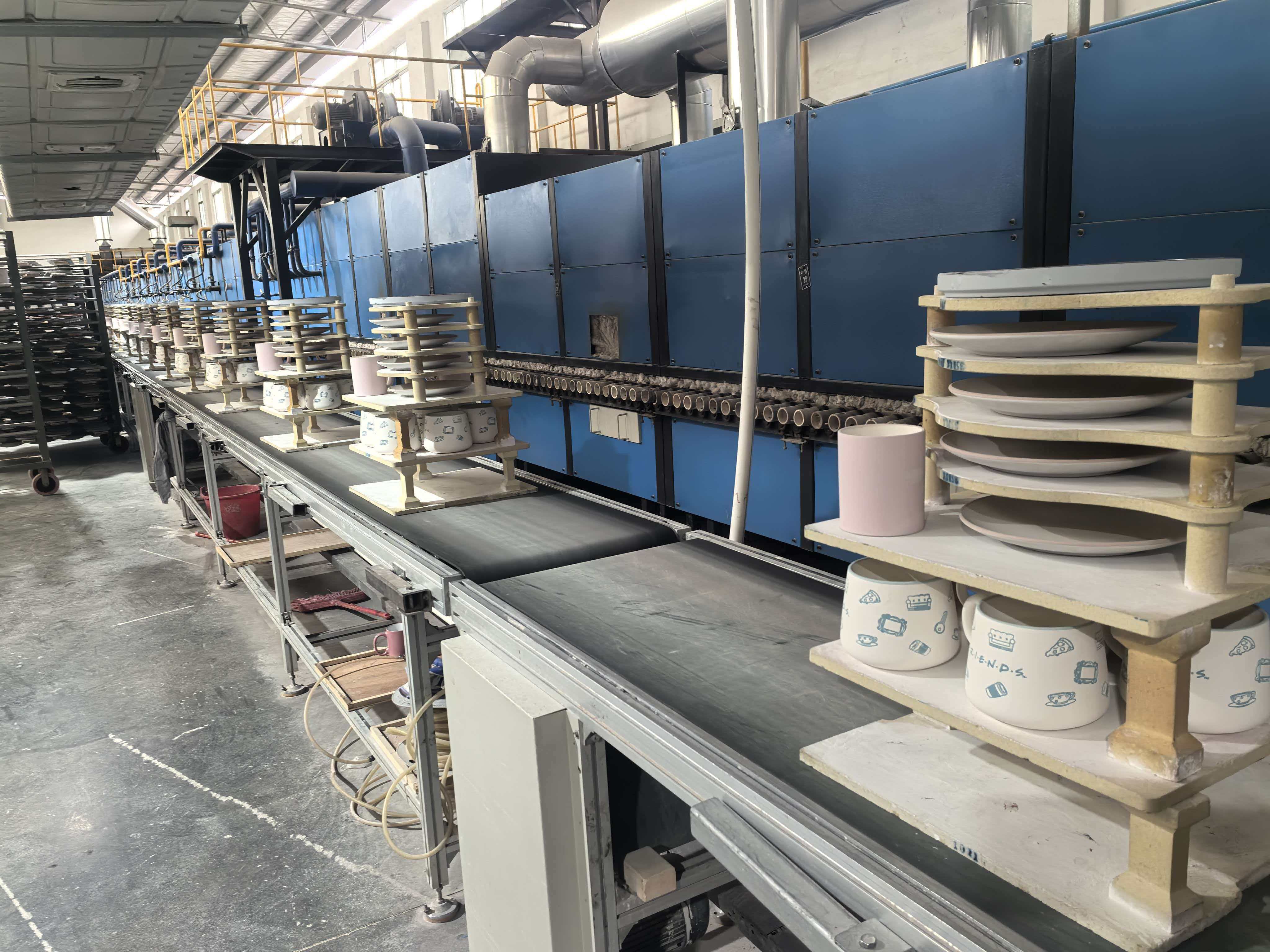 Expert Ceramic Mug Manufacturing Process A large factory floor showing the ceramic mug manufacturing process