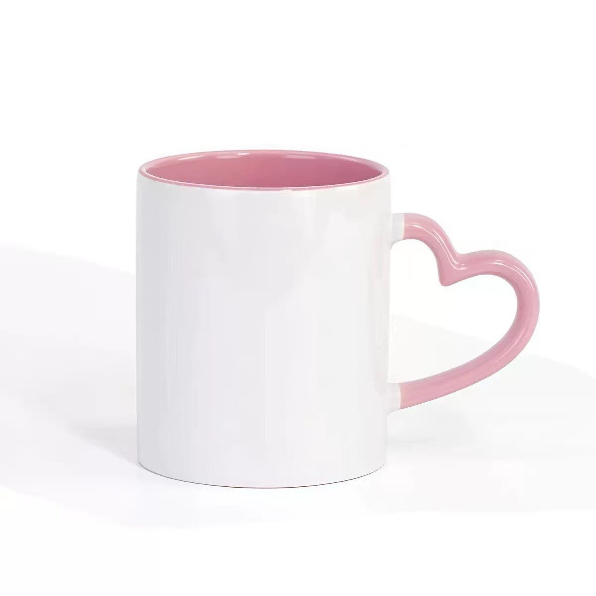 Pink heart handle sublimation mug front view