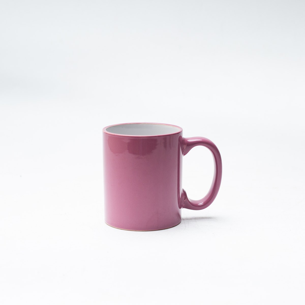 Rose pink glossy glaze stoneware mug cylinder body front view