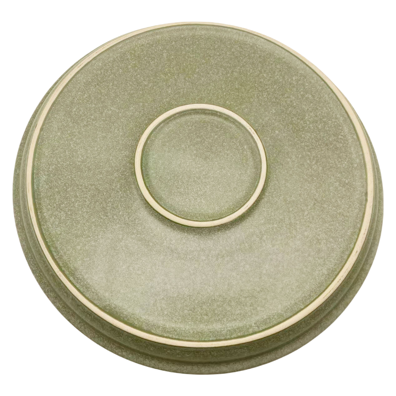 Clos Up of Hand Drawn White Rings & Speckled Texture on Green Stoneware Set, Artisan Craft for Unique Rustic Charm