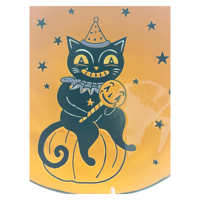 Whimsical Halloween Themed Patterns On Ceramic Plates For Spooky Celebrations