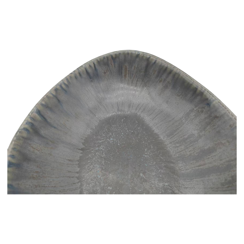 Close-Up Of Unique Reactive Glaze Finish On Ceramic Bowl Surface