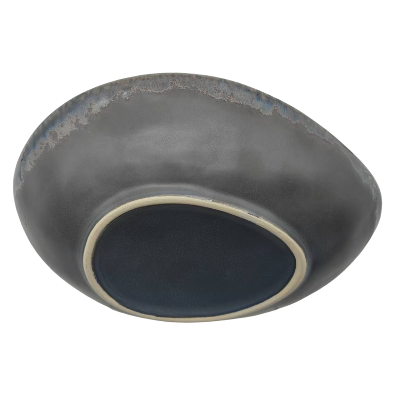 Side Profile Of Wide Rim Stoneware Plate With Rustic Design