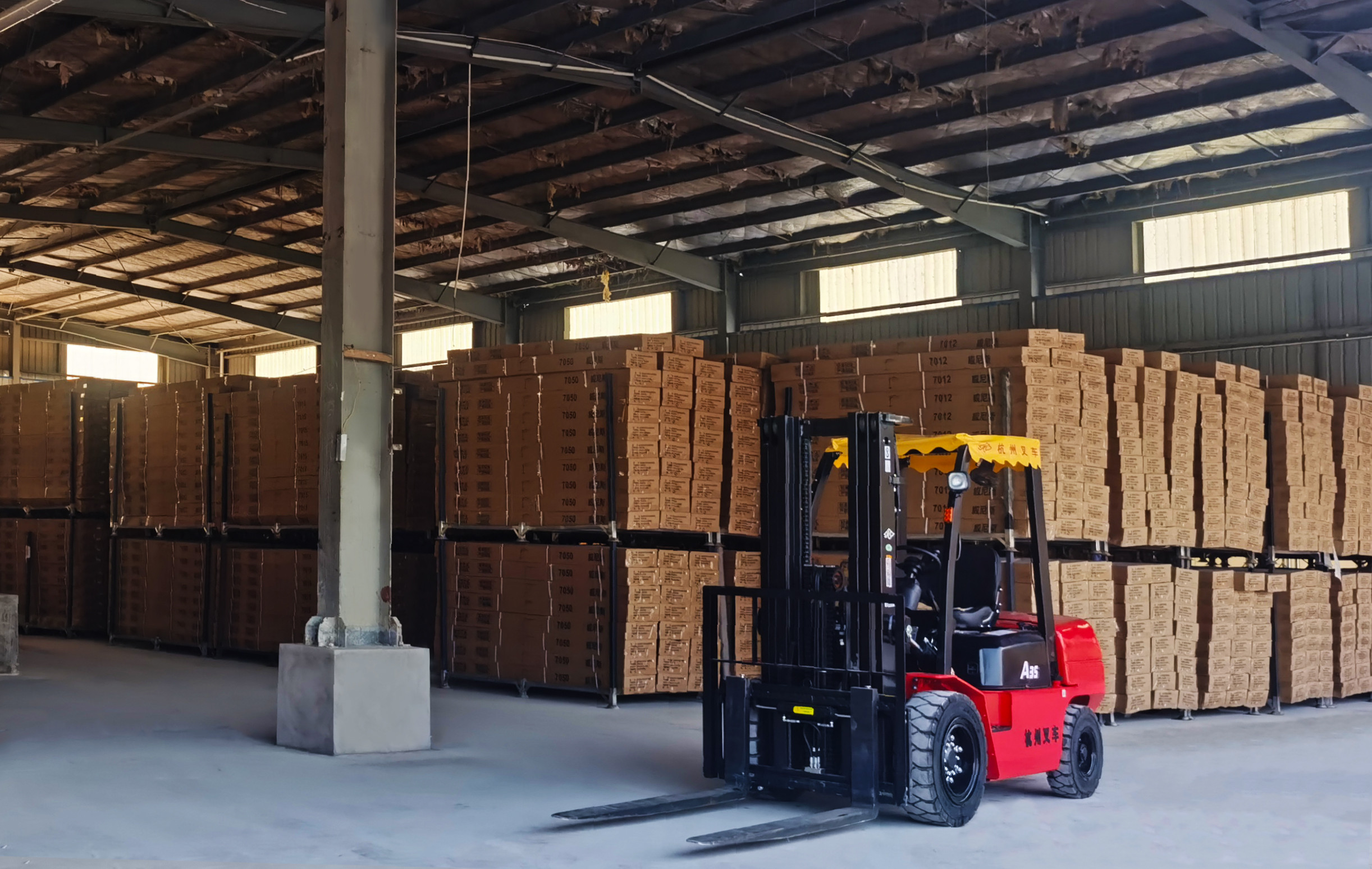 A discolored and damaged umbrella canopy with bleach stains.