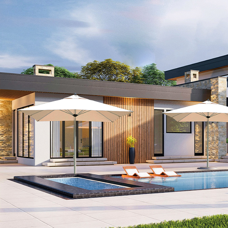 An insurance agent discussing a policy with a business owner at a desk.