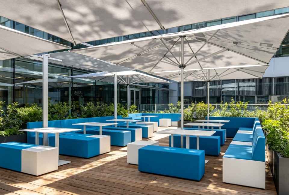 Commercial sun umbrella by a waterfront pool