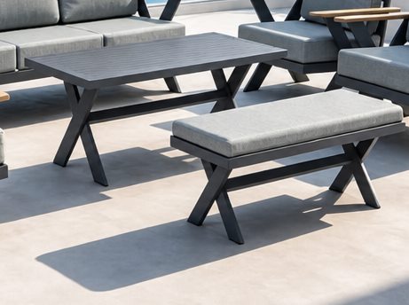 Dark slatted coffee table and footstool on crossed trestle legs