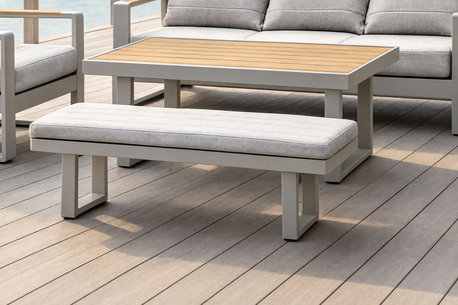 Light wood slat coffee table top and footstool bench of the FHSF207 outdoor sofa set