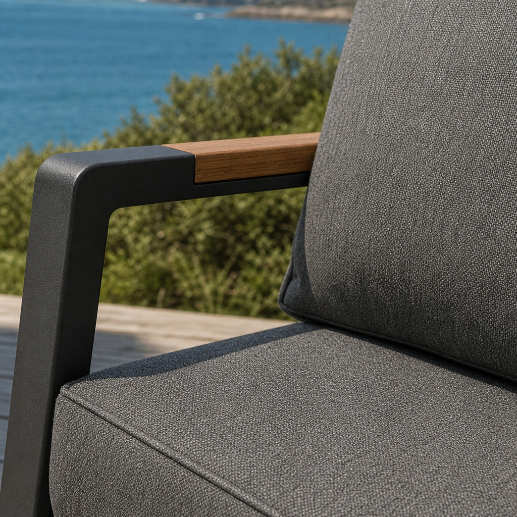 FHSF082 armrest where the solid wood cap meets the dark grey aluminum frame