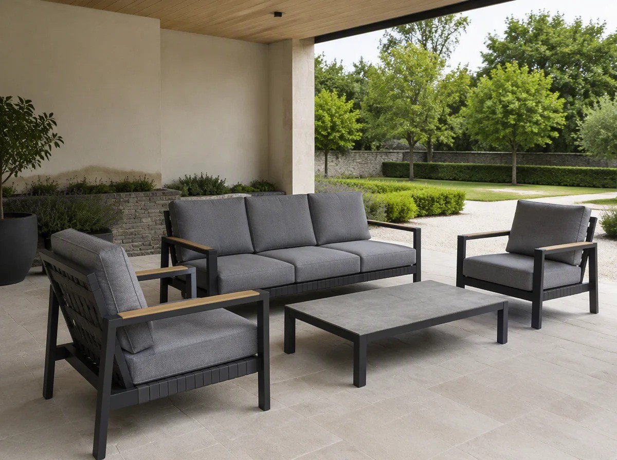 Charcoal aluminium outdoor sofa set with wood-look arms under a covered garden pavilion with a timber ceiling